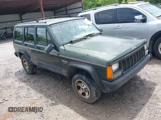 1996 Jeep Cherokee Sport with VIN 1J4FT68S6TL269966, listed as a IAAI auction lot 42211628 with 212,944 mi miles and . Bid and sale history available at DreamBid. Image 1.
