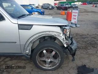 2007 Dodge Nitro SXT with VIN 1D8GU28K37W562598, listed as a IAAI auction lot 42491176 with 202,676 mi miles and . Bid and sale history available at DreamBid. Image 6.