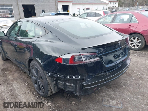 2021 Tesla Model S Plaid with VIN 5YJSA1E69MF439147, listed as a IAAI auction lot 41825656 with 25,626 mi miles. Bid and sale history available at carsss.com. Image 14.