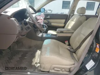 1999 Infiniti Q45 z VIN JNKBY31A6XM600579, wystawiony jako Copart lot #57683075 z przebiegiem 215 415 mil mil oraz Szkoda całkowita • Salvage title. Historia ofert i sprzedaży dostępna na DreamBid. Obrazek 7.
