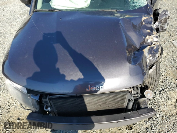 2016 Jeep Compass Latitude z VIN 1C4NJCEA8GD620068, wystawiony jako Copart lot #52725665 z przebiegiem Nie podano mil oraz Szkoda całkowita • Salvage title. Historia ofert i sprzedaży dostępna na DreamBid. Obrazek 13.