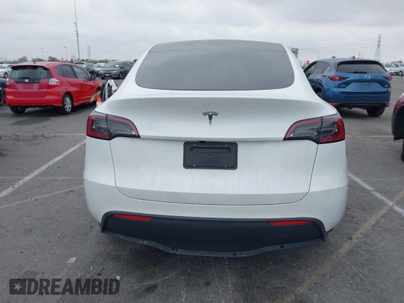 2024 Tesla Model Y with VIN 7SAYGDED6RF166543, listed as a IAAI auction lot 41713362 with Not Provided miles and . Bid and sale history available at DreamBid. Image 16.