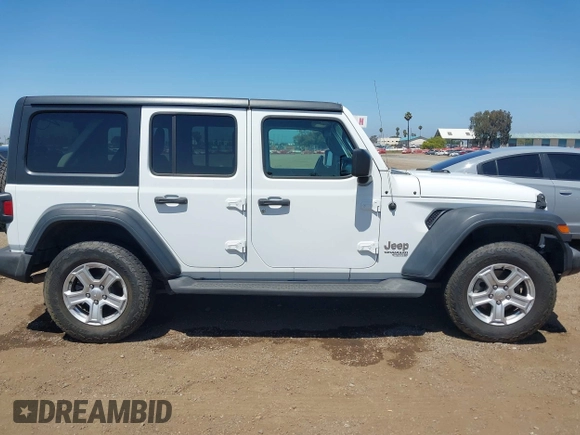 2018 Jeep Wrangler Unlimited Sport with VIN 1C4HJXDG4JW319142, listed as a IAAI auction lot 42702550 with 72,023 mi miles and . Bid and sale history available at DreamBid. Image 13.