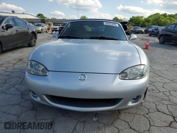 2003 Mazda MX-5 Miata Cloth with VIN JM1NB353230312510, listed as a Copart auction lot 54925895 with 141,391 mi miles and Salvage Title. Bid and sale history available at DreamBid. Image 5.