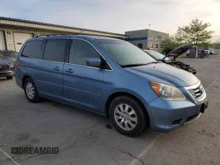 2009 Honda Odyssey EX-L with VIN 5FNRL38759B004710, listed as a Copart auction lot 54210425 with 171,674 mi miles and Salvage Title. Bid and sale history available at DreamBid. Image 4.