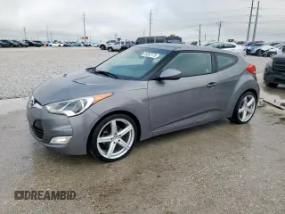 2013 Hyundai Veloster w/Black Int z VIN KMHTC6AD2DU152929, wystawiony jako Copart lot #56062175 z przebiegiem 126 301 mil mil oraz Szkoda całkowita • Salvage title. Historia ofert i sprzedaży dostępna na DreamBid. Obrazek 1.