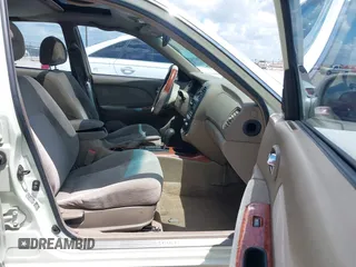 2002 Kia Optima LX z VIN KNAGD126325144218, wystawiony jako IAAI lot #42596691 z przebiegiem 220 972 mil mil oraz . Historia ofert i sprzedaży dostępna na DreamBid. Obrazek 5.