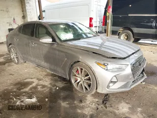 2021 Genesis G70 2.0T Sport with VIN KMTG24LA7MU067165, listed as a IAAI auction lot 41441008 with 43,792 mi miles. Bid and sale history available at carsss.com. Image 1.