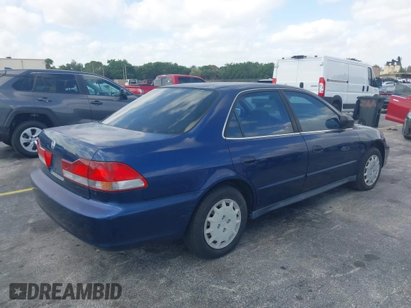 2002 Honda Accord LX with VIN JHMCG56482C014034, listed as a IAAI auction lot 42110164 with 95,657 mi miles and . Bid and sale history available at DreamBid. Image 4.