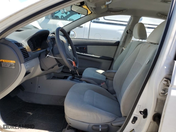 2006 Kia Spectra EX with VIN KNAFE121665214328, listed as a Copart auction lot 49209285 with 91,852 mi miles and Salvage Title. Bid and sale history available at carsss.com. Image 7.