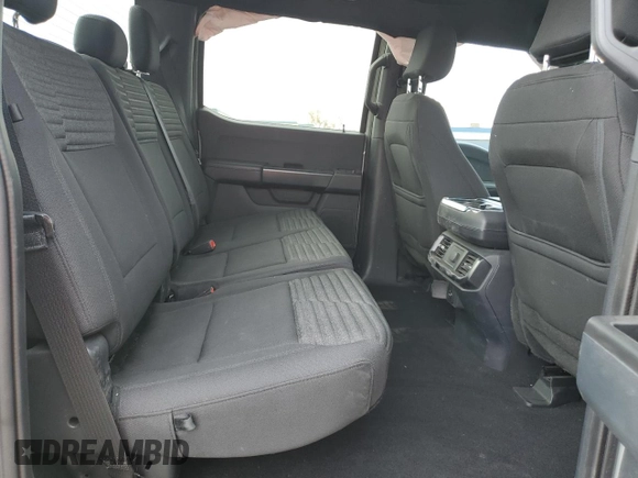 2023 Ford F-150 XL with VIN 1FTEW1CP4PKF86851, listed as a Copart auction lot 50611185 with 15,773 mi miles and Salvage Title. Bid and sale history available at DreamBid. Image 11.