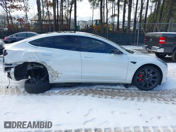 2020 Tesla Model 3 Performance z VIN 5YJ3E1EC5LF791879, wystawiony jako IAAI lot #41302692 z przebiegiem 76 502 mil mil oraz . Historia ofert i sprzedaży dostępna na DreamBid. Obrazek 14.