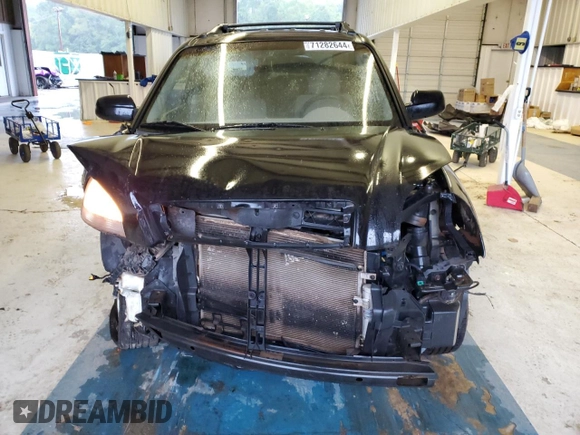 2005 Hyundai Tucson GL with VIN KM8JM12BX5U205060, listed as a Copart auction lot 71282644 with 243,076 mi miles and Salvage Title. Bid and sale history available at carsss.com. Image 5.