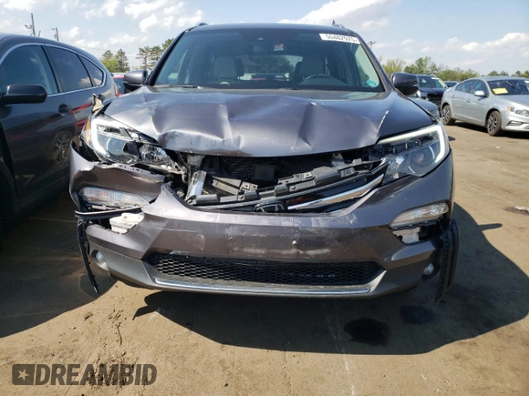 2017 Honda Pilot Touring with VIN 5FNYF6H9XHB023385, listed as a Copart auction lot 55482975 with 105,039 mi miles and Salvage Title. Bid and sale history available at carsss.com. Image 5.
