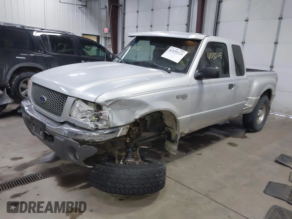 2001 Ford Ranger XL Fleet with VIN 1FTZR15E81TA57053, listed as a IAAI auction lot 41535115 with 146,784 mi miles. Bid and sale history available at carsss.com. Image 2.