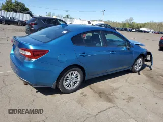 2018 Subaru Impreza Premium with VIN 4S3GKAD63J3605854, listed as a Copart auction lot 54986795 with 59,119 mi miles and Salvage title. Bid and sale history available at DreamBid. Image 3.