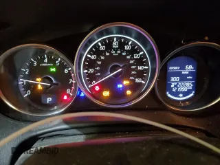2016 Mazda CX-5 Sport z VIN JM3KE4BY9G0824021, wystawiony jako Copart lot #52392345 z przebiegiem 121 990 mil mil oraz Szkoda całkowita • Salvage title. Historia ofert i sprzedaży dostępna na DreamBid. Obrazek 9.