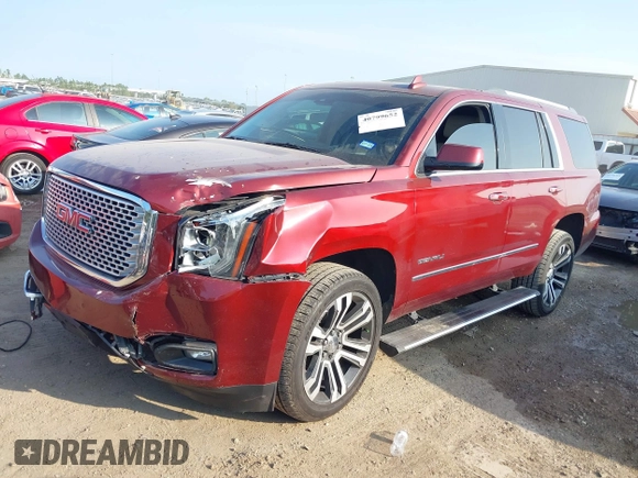 2017 GMC Yukon Denali with VIN 1GKS1CKJ4HR141145, listed as a IAAI auction lot 40799652 with 104,369 mi miles. Bid and sale history available at carsss.com. Image 16.