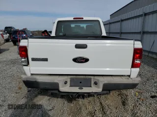 2010 Ford Ranger with VIN 1FTLR1EE1APA37032, listed as a Copart auction lot 82587614 with 215,440 mi miles and Salvage Title. Bid and sale history available at DreamBid. Image 6.