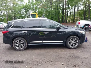2015 Infiniti QX60 with VIN 5N1AL0MM7FC528002, listed as a IAAI auction lot 42260916 with 228,379 mi miles and . Bid and sale history available at DreamBid. Image 13.