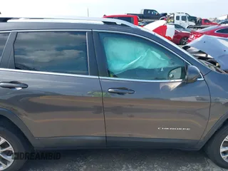 2019 Jeep Cherokee Latitude Plus with VIN 1C4PJLLB3KD143546, listed as a IAAI auction lot 42160353 with 69,296 mi miles and . Bid and sale history available at DreamBid. Image 14.