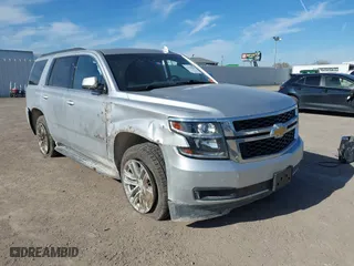 2020 Chevrolet Tahoe LT with VIN 1GNSCBKC5LR226822, listed as a IAAI auction lot 41334853 with 77,091 mi miles. Bid and sale history available at carsss.com. Image 1.