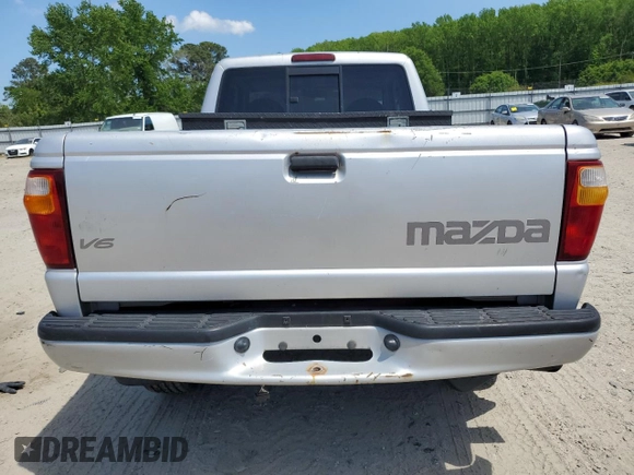 2002 Mazda B-Series Truck DS z VIN 4F4YR16U72TM03068, wystawiony jako Copart lot #55536395 z przebiegiem 199 895 mil mil oraz Czysty tytuł • Clean title. Historia ofert i sprzedaży dostępna na DreamBid. Obrazek 6.