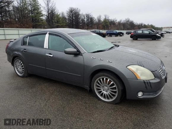 2004 Nissan Maxima SE with VIN 1N4BA41E14C901248, listed as a Copart auction lot 52100375 with 124,473 mi miles and Salvage Title. Bid and sale history available at DreamBid. Image 4.