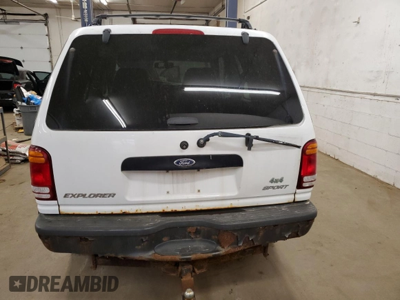 1999 Ford Explorer z VIN 1FMZU24E6XUC14115, wystawiony jako Copart lot #77702694 z przebiegiem 169 783 mil mil oraz Czysty tytuł • Clean title. Historia ofert i sprzedaży dostępna na DreamBid. Obrazek 6.