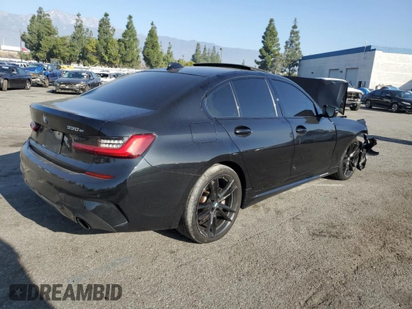 2021 BMW 3 Series 330e with VIN 3MW5P7J03M8C03997, listed as a Copart auction lot 83113614 with 0 mi miles and Salvage Title. Bid and sale history available at carsss.com. Image 3.