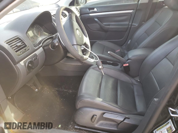 2009 Volkswagen Jetta z VIN 3VWTZ71K99M252459, wystawiony jako Copart lot #77893704 z przebiegiem 181 022 mil mil oraz Szkoda całkowita • Salvage title. Historia ofert i sprzedaży dostępna na DreamBid. Obrazek 7.