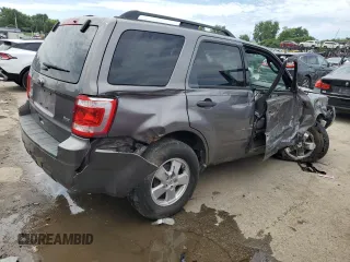 2012 Ford Escape XLT with VIN 1FMCU9DG8CKB42968, listed as a Copart auction lot 61763275 with 233,998 mi miles and Salvage title. Bid and sale history available at DreamBid. Image 3.