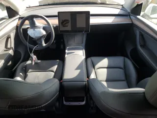 2024 Tesla Model Y Long Range with VIN 7SAYGDEE0RF081948, listed as a Copart auction lot 52612805 with 12,099 mi miles and Salvage Title. Bid and sale history available at DreamBid. Image 8.
