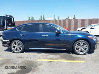 2015 Infiniti Q70 with VIN JN1BY1PP8FM601834, listed as a IAAI auction lot 42028330 with 106,285 mi miles and . Bid and sale history available at DreamBid. Image 13.