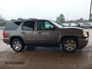 2014 GMC Yukon SLT with VIN 1GKS1CE00ER164663, listed as a IAAI auction lot 41547771 with 178,998 mi miles. Bid and sale history available at carsss.com. Image 13.