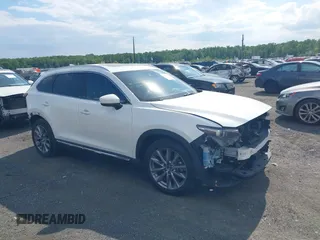 2021 Mazda CX-9 Grand Touring z VIN JM3TCBDY2M0541290, wystawiony jako IAAI lot #42216643 z przebiegiem 38 661 mil mil oraz . Historia ofert i sprzedaży dostępna na DreamBid. Obrazek 1.