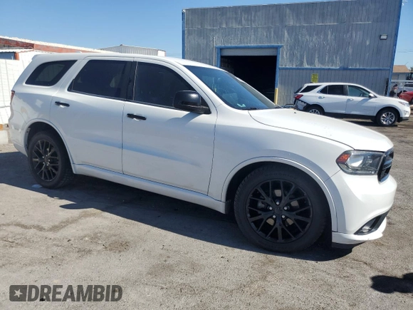 2014 Dodge Durango SXT with VIN 1C4RDHAG0EC972094, listed as a Copart auction lot 77396084 with 189,425 mi miles and Salvage Title. Bid and sale history available at DreamBid. Image 4.