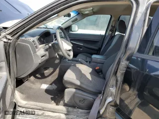 2009 Jeep Grand Cherokee Laredo with VIN 1J8GR48K79C545800, listed as a Copart auction lot 51138355 with 204,913 mi miles and Salvage Title. Bid and sale history available at carsss.com. Image 7.