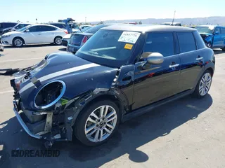 2017 MINI Hardtop 4 Door Cooper S z VIN WMWXU3C56H2D33072, wystawiony jako IAAI lot #41847726 z przebiegiem 81 783 mil mil oraz . Historia ofert i sprzedaży dostępna na DreamBid. Obrazek 2.