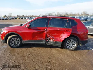 2018 Volkswagen Tiguan S with VIN 3VV1B7AX2JM050594, listed as a IAAI auction lot 41681117 with 134,654 mi miles. Bid and sale history available at carsss.com. Image 14.