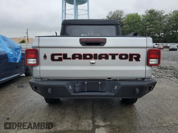 2022 Jeep Gladiator Texas Trail with VIN 1C6HJTAG7NL165957, listed as a Copart auction lot 58309485 with 86,805 mi miles and Salvage title. Bid and sale history available at DreamBid. Image 6.