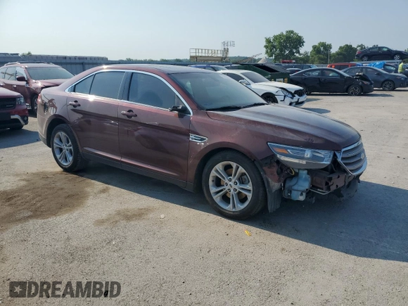 2015 Ford Taurus SEL with VIN 1FAHP2E96FG161735, listed as a Copart auction lot 61865294 with 148,070 mi miles and Salvage Title. Bid and sale history available at DreamBid. Image 4.
