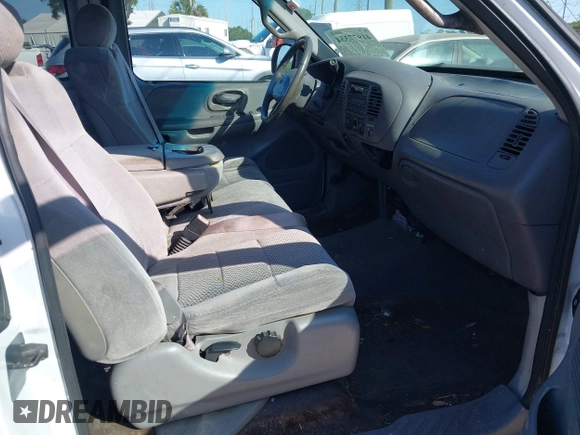 2002 Ford F-150 XL with VIN 1FTRX17WX2NA92467, listed as a IAAI auction lot 41977334 with 176,902 mi miles. Bid and sale history available at carsss.com. Image 5.