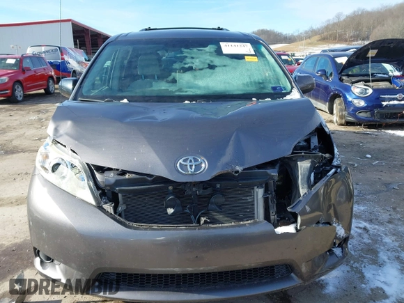 2013 Toyota Sienna LE with VIN 5TDJK3DC8DS056730, listed as a IAAI auction lot 41141247 with 166,579 mi miles and . Bid and sale history available at DreamBid. Image 12.