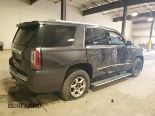 2015 GMC Yukon Denali with VIN 1GKS2CKJ2FR677604, listed as a Copart auction lot 51714505 with 146,648 mi miles and Salvage Title. Bid and sale history available at carsss.com. Image 3.