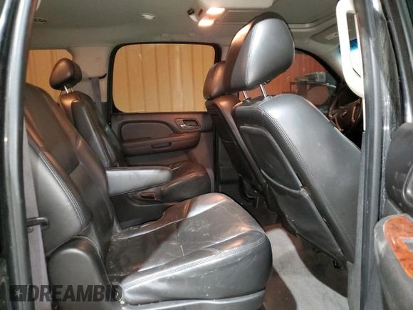 2010 Chevrolet Suburban LTZ with VIN 1GNUKKE38AR283830, listed as a Copart auction lot 84887104 with 298,548 mi miles and Salvage Title. Bid and sale history available at carsss.com. Image 11.