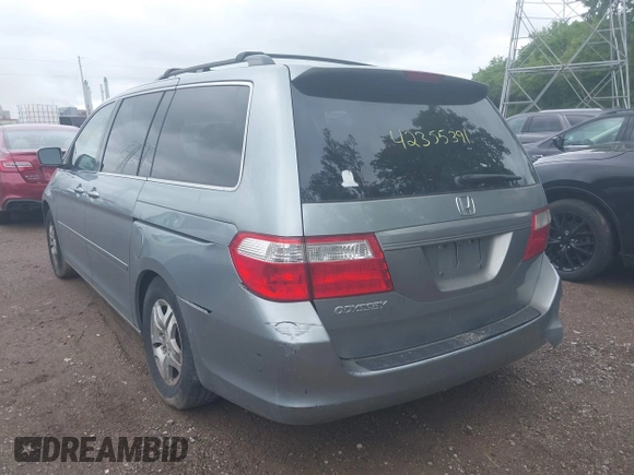 2007 Honda Odyssey EX z VIN 5FNRL38407B084436, wystawiony jako IAAI lot #42355391 z przebiegiem 144 607 mil mil oraz . Historia ofert i sprzedaży dostępna na DreamBid. Obrazek 3.