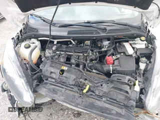 2019 Ford Fiesta SE z VIN 3FADP4EJ5KM132862, wystawiony jako IAAI lot #40893430 z przebiegiem 91 011 mil mil oraz . Historia ofert i sprzedaży dostępna na DreamBid. Obrazek 10.
