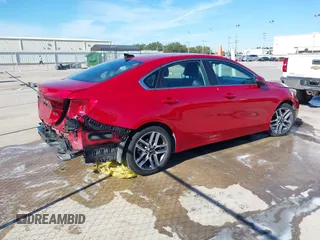 2021 Kia Forte EX with VIN 3KPF54AD1ME404443, listed as a IAAI auction lot 40952314 with 108,035 mi miles and . Bid and sale history available at DreamBid. Image 4.