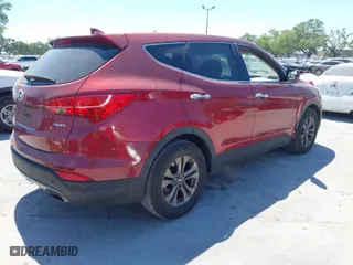 2015 Hyundai Santa Fe Sport with VIN 5XYZT3LB3FG281999, listed as a IAAI auction lot 41862044 with 241,439 mi miles. Bid and sale history available at carsss.com. Image 4.
